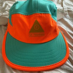 Ciele GOCap running hat Orange and Teal Run Mountains
